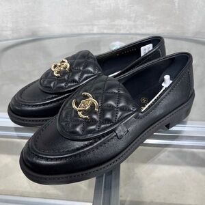 Gucci Black Quilted Loafers with Gold Accent